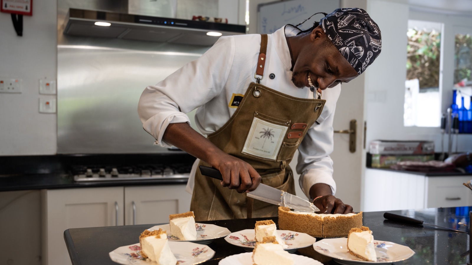 One of the chefs finishing a dessert