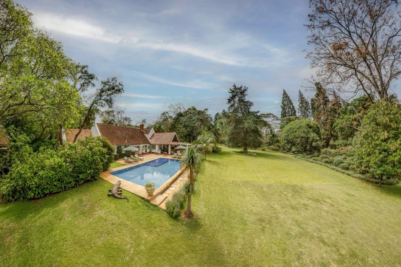 The pool seen across the gardens