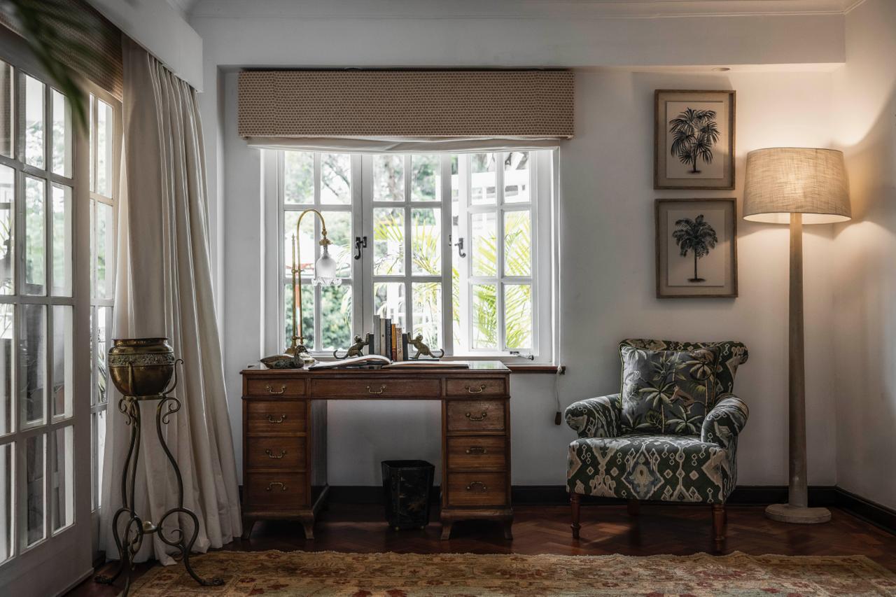 A writing desk and armchair in the sitting room